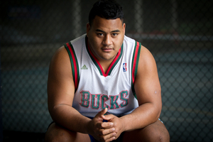 The 'Tongan Thor' signs for the Reds. Photo by Sarah Ivey