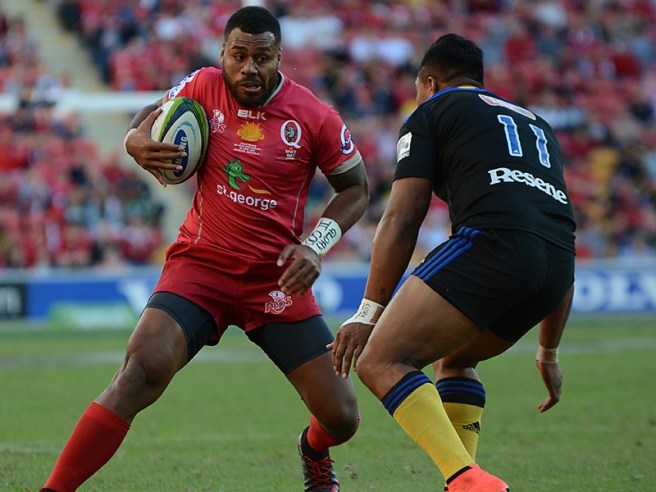 Samu Kerevi shimmies past Hurricanes' winger Julian Savea. Photo sourced from: www.greenandgoldrugby.com