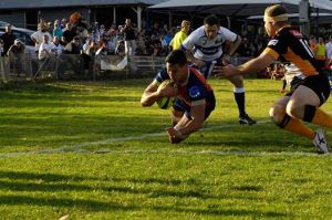 Brad Kapa scoring the final try for the Rams in their 32-31 point loss to the Eagles. (JB Photography)