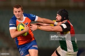 Paul Asquith running the ball for the home side against the Rays. Photo sourced from GettyImages